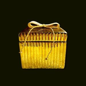 Candle in the gold box